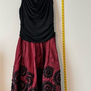 Elegant Black and Red Dress with Floral Accents